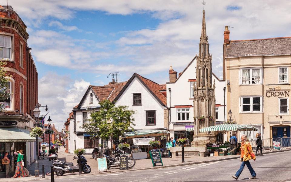 'Walking down the patchouli-scented High Street lined with colourful vegan cafes, healing centres and crystal shops, I meet white witches offering New Moon blessings' - Getty