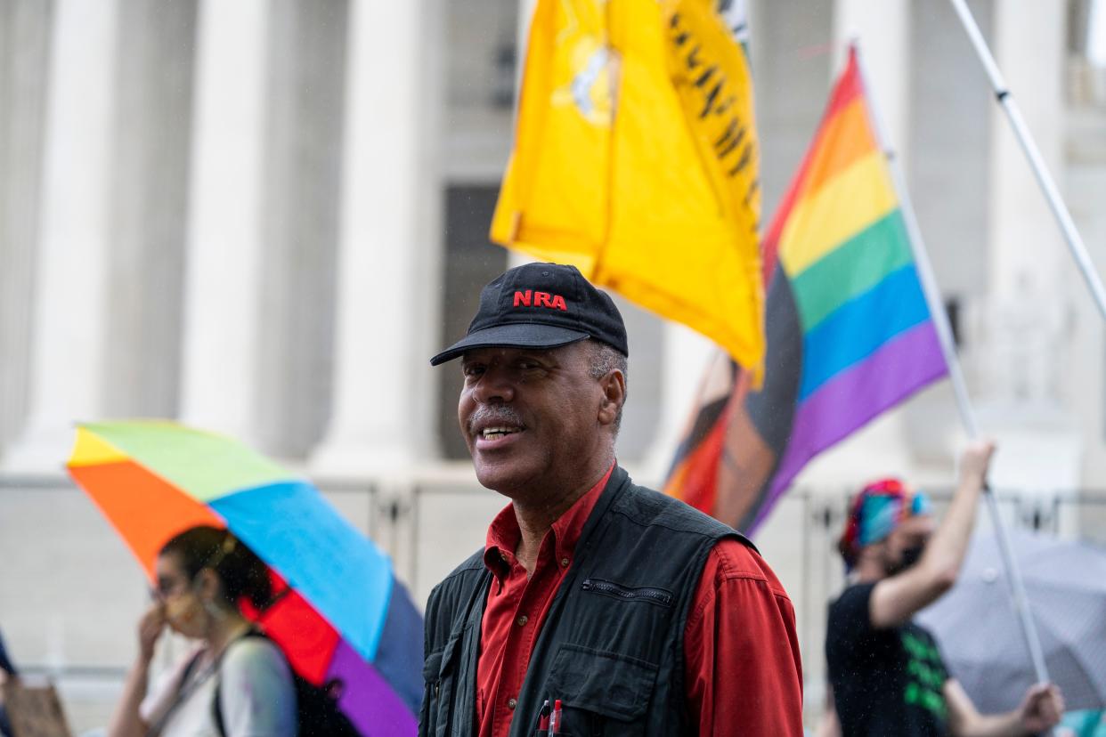 Steve Brown, 61, of Springfield, Va., celebrates after the Supreme Court struck down a New York  law that required people to show “proper cause” to carry a concealed handgun outside the home on June 23 in Washington.