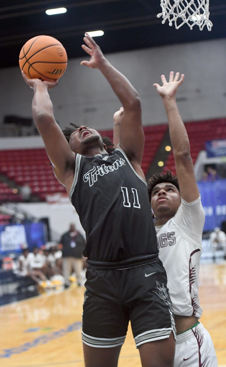 Mariner's Kelvin Jimenez (11) shoots against Norland in the Class 5A semifinal during the Florida High School State Championships at the RP Funding Center in Lakeland on Wednesday, March 6, 2024. Norland defeated Mariner 53-37.