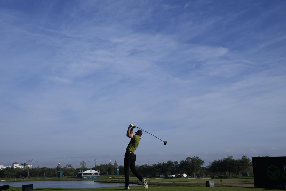 Austin Eckroat, of the United States, tees off on the first hole during the third round of the Mexico Open golf tournament in Puerto Vallarta, Mexico, Saturday, Feb. 24, 2024. (AP Photo/Fernando Llano)