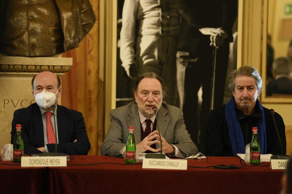 Italian conductor Riccardo Chailly, center, speaks during a news conference to present Giuseppe Verdi's 'Macbeth', who will open the opera season at the La Scala opera house next, Dec.7, in Milan, Italy, Monday, Nov. 29, 2021. (AP Photo/Luca Bruno)