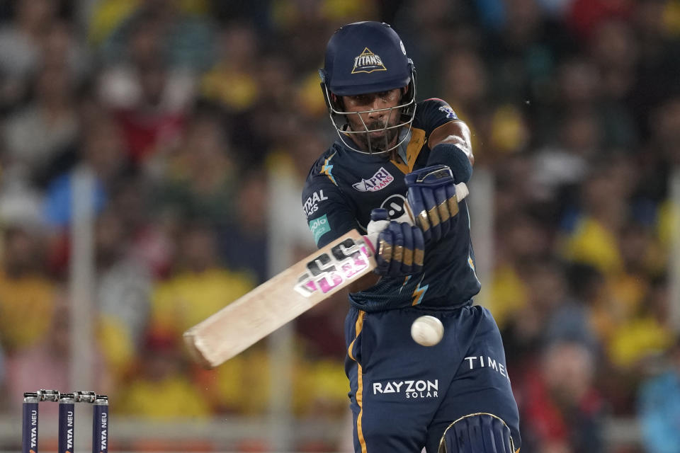 Gujarat Titans' Wriddhiman Saha plays a shot during the Indian Premier League final cricket match between Chennai Super Kings and Gujarat Titans in Ahmedabad, India, Monday, May 29, 2023. (AP Photo/Ajit Solanki)