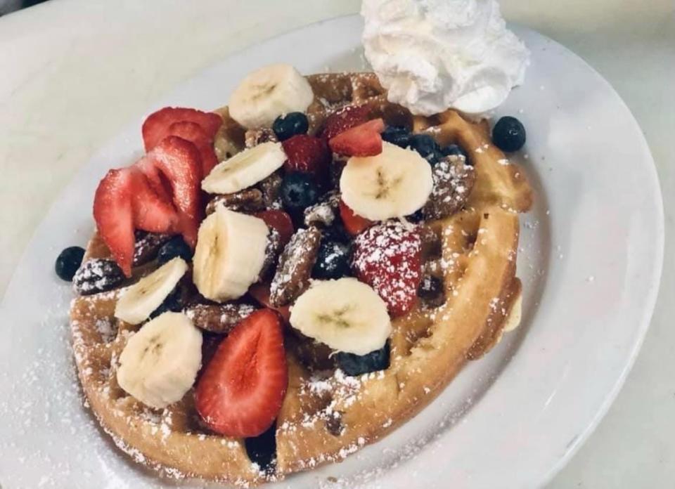 Blu Jelly's Belgian waffles topped with berries and bananas, $11.