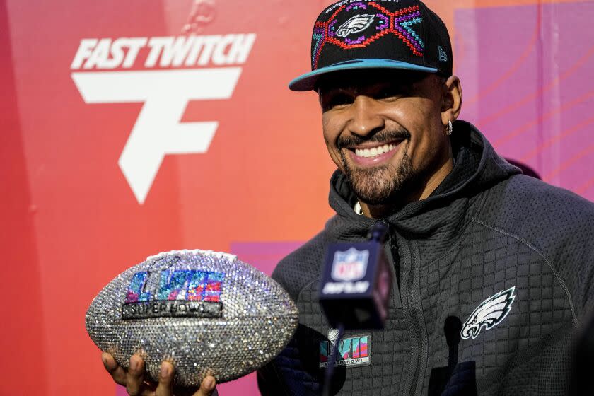 Philadelphia Eagles quarterback Jalen Hurts speaks to the media during the NFL football Super Bowl 57 opening night, Monday, Feb. 6, 2023, in Phoenix. The Kansas City Chiefs will play the Philadelphia Eagles on Sunday. (AP Photo/David J. Philip)