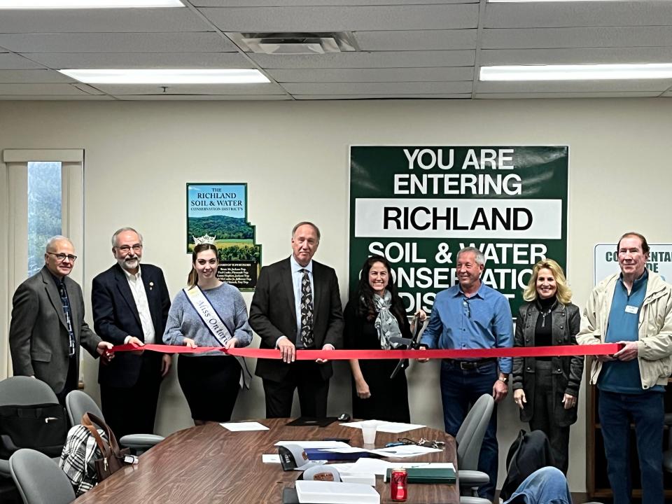 Richland SWCD held a ribbon-cutting ceremony on Jan. 18 to kick off its 75th anniversary year. Taking part in the ceremony were (left to right): Lexington Mayor Brian White, Mansfield Council President David Falquette, Miss Ontario Abigail Kern, Richland County Commissioner Cliff Mears, Richland SWCD Director Erica Thomas, Richland SWCD Board Chair Brian Alt, Richland Area Chamber Member Services Coordinator Jennifer Wagner and Doc Stumbo.