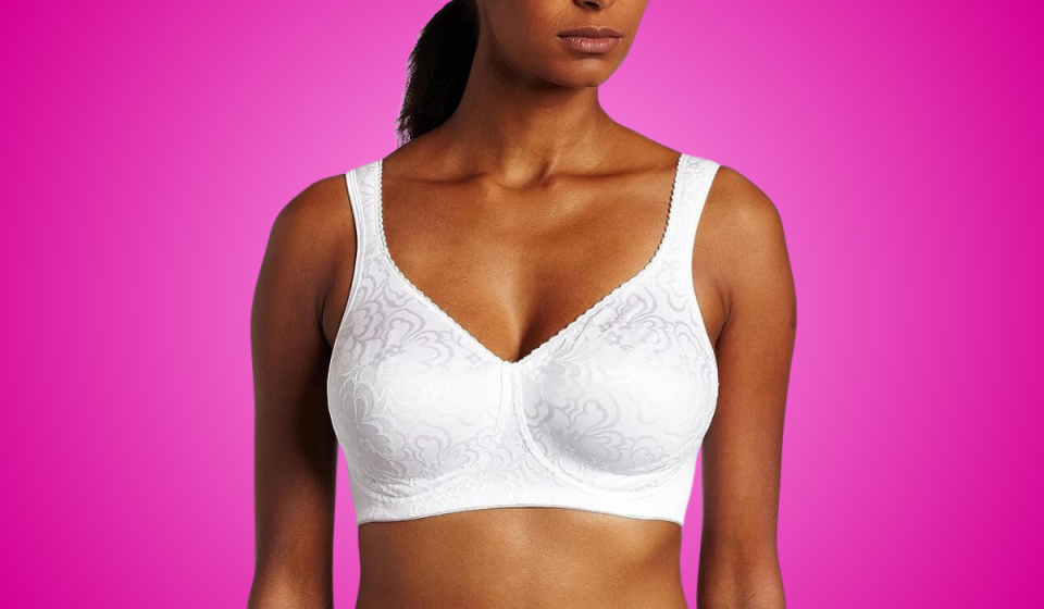 A woman wearing the Playtex bra in white.