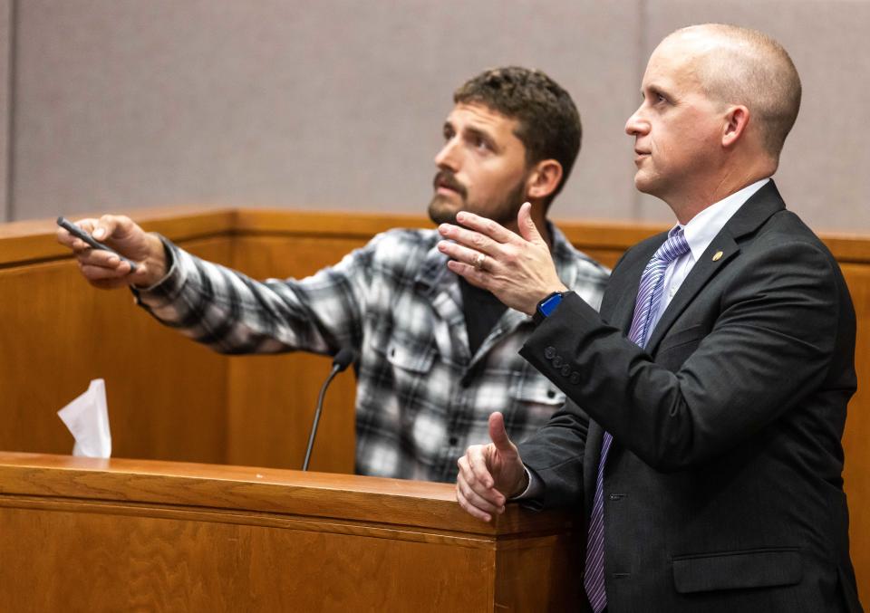 Assistant State Attorney Toby Hunt with a witness at trial.