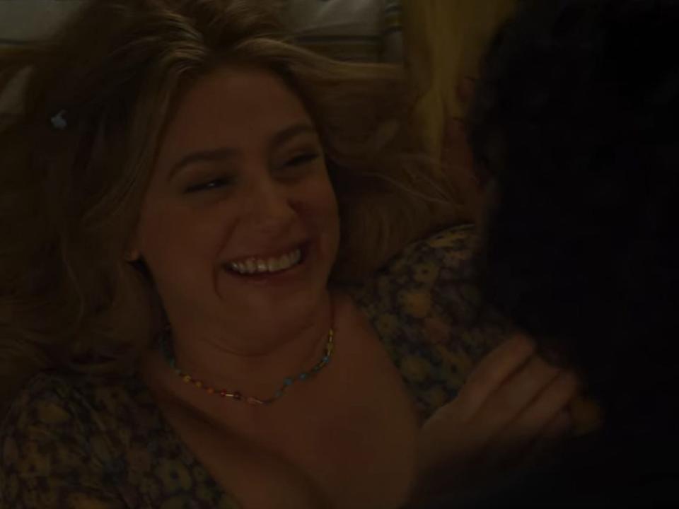 natalie laughing in bed with gabe in look both ways