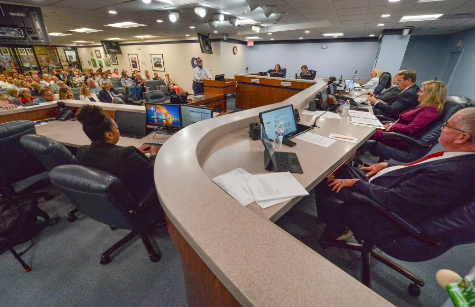 Martin County Commission members (right) listen to public comments from the audience during a public hearing to consider adoption of  the Comprehensive Plan Ammendment to the Future Land Use Map on 1,493.91 acres, during the commission meeting inside the commission chambers on Tuesday, Sept. 13, 2022, in Stuart. If approved, the request would change the future land use designation from Agricultural to Rural Lifestyle.