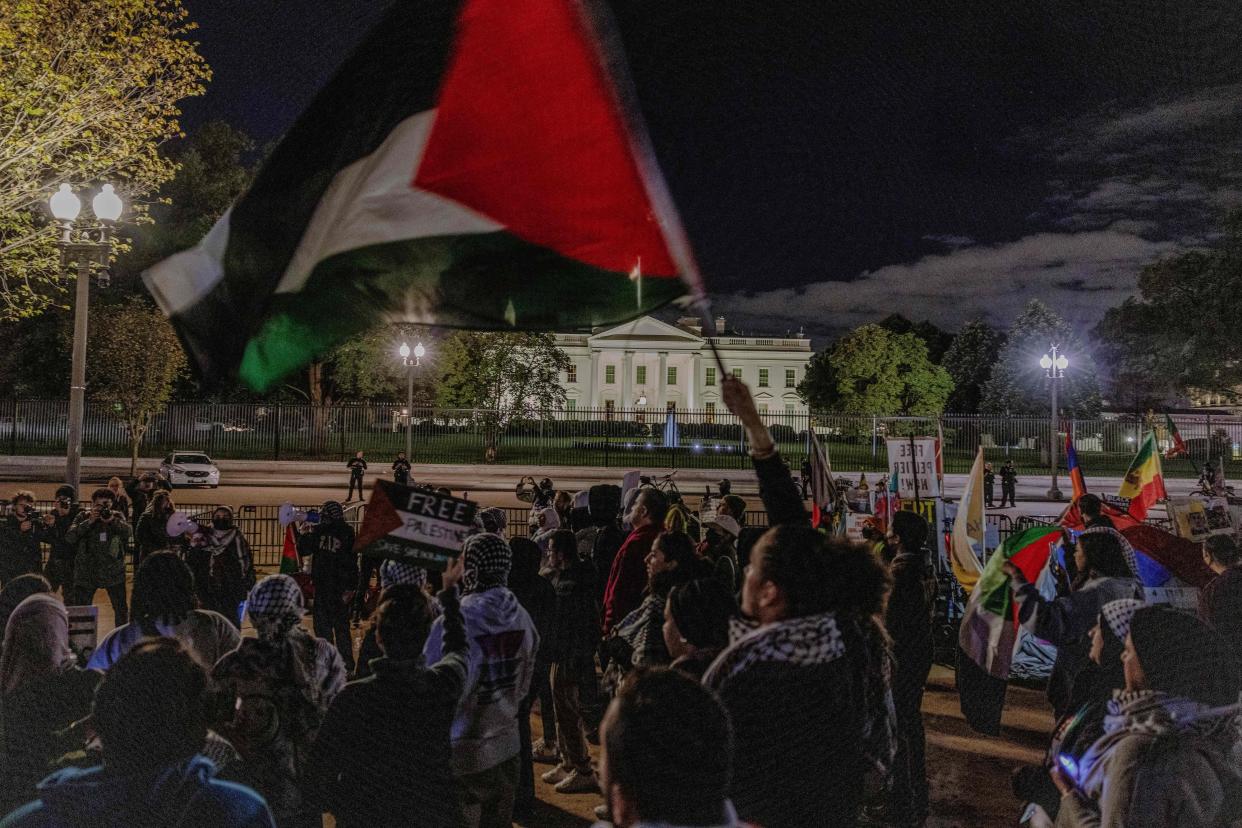 Demonstrators protest in solidarity with Palestinians in front of the White House on Oct. 17.