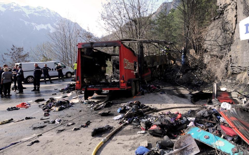 Maurice Wrightson had been descending the precarious D211 road from French ski resort Alpe d'Huez with a coach full of British resort staff when he deliberately drove the vehicle into the rocks - AFP