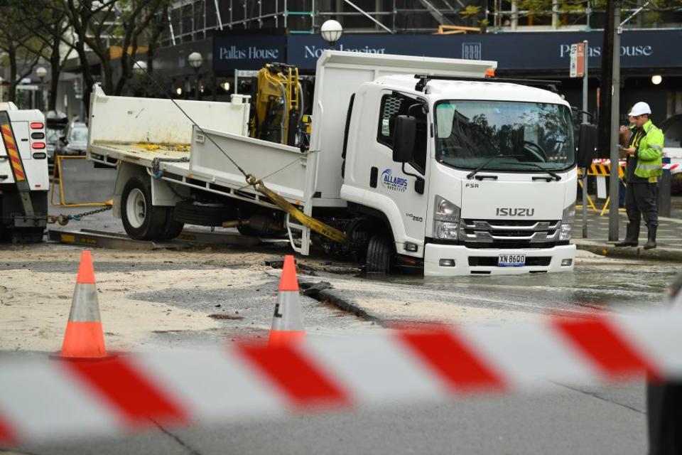 A truck stuck in a sinkhole at Double Bay in Sydney on Tuesday morning.