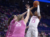 Penn State's Taniyah Thompson (23) pulls up to shoot on Iowa's Monika Czinano (25) during the first half of an NCAA college basketball game, Sunday, Feb. 5, 2023, in State College, Pa. (AP Photo/Gary M. Baranec)