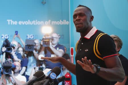 Gold Coast 2018 Commonwealth Games - Gold Coast, Australia - April 12, 2018. Former Jamaican sprinter Usain Bolt addresses a press conference. REUTERS/David Gray