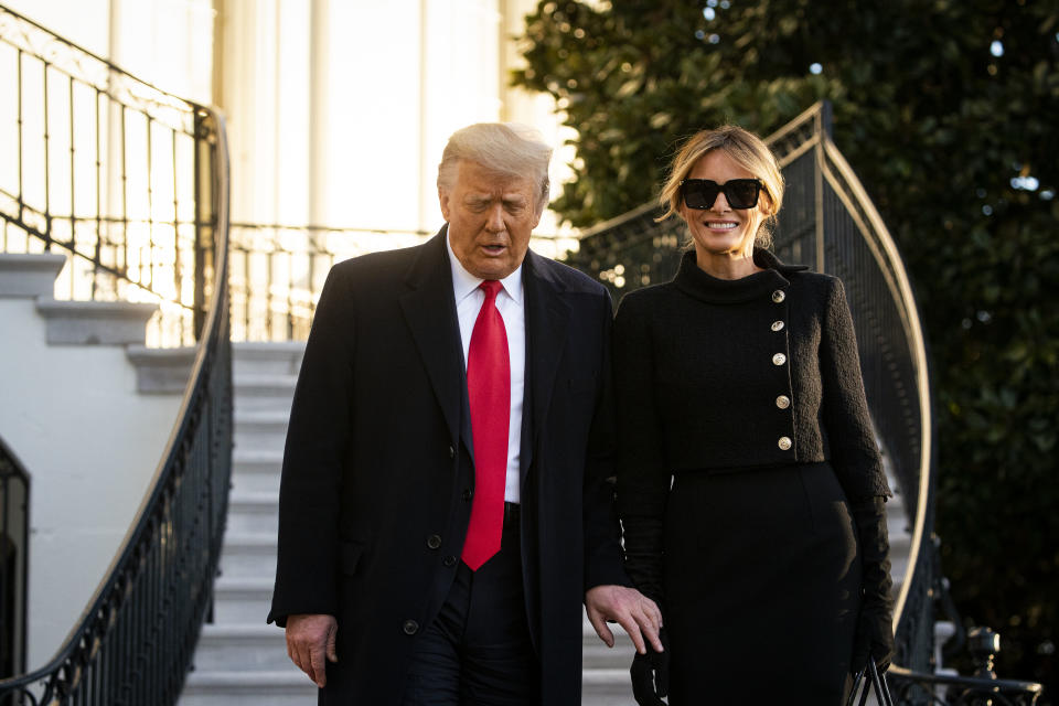 U.S. President Donald Trump, left, and U.S. First Lady Melania Trump exit the White House before boarding Marine One on the South Lawn in Washington, D.C., U.S., on Wednesday, Jan. 20, 2021. Trump departs Washington with Americans more politically divided and more likely to be out of work than when he arrived, while awaiting trial for his second impeachment - an ignominious end to one of the most turbulent presidencies in American history.