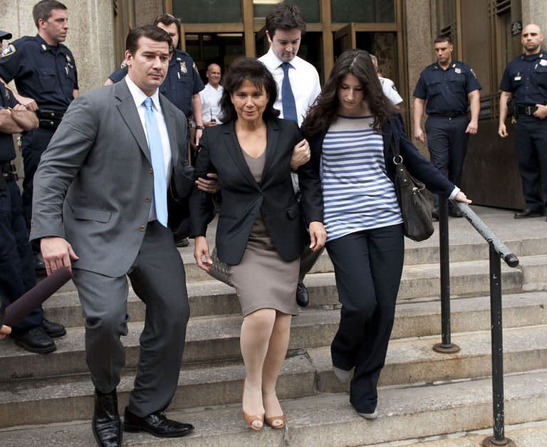 Anna Sinclair (C), wife of Dominique Strauss-Kahn, leaves Manhattan Criminal Court with stepdaughter Camille Strauss-Kahn (R). Dominique Strauss-Kahn won bail Thursday after being indicted on "serious" sex charges, but was ordered to remain under house arrest with an armed guard and post $1 million in cash