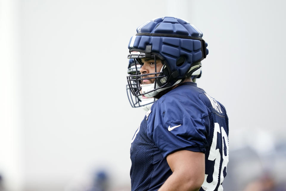 Chicago Bears offensive tackle Darnell Wright participates in the NFL football team’s Back Together training camp event for fans on Saturday, July 29, 2023, in Lake Forest , Ill. (AP Photo/Charles Rex Arbogast) ORG XMIT: ILCA