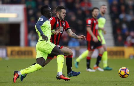 Football Soccer Britain - AFC Bournemouth v Liverpool - Premier League - Vitality Stadium - 4/12/16 Bournemouth's Jack Wilshere in action with Liverpool's Sadio Mane Reuters / Eddie Keogh Livepic