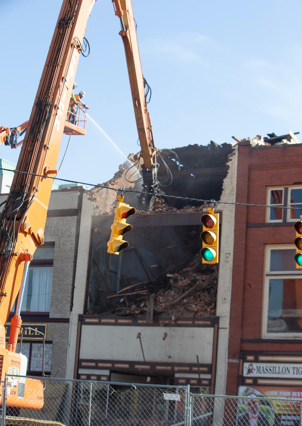 Demolition of two buildings, 125 and 129 Lincoln Way W, began Wednesday afternoon in downtown Massillon. Louisville-based Eslich Wrecking Co. is expected to be at the work site into next week.