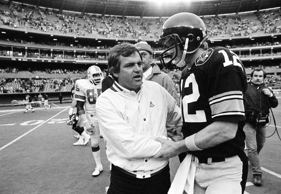 Ron Meyer, left, who coached the Patriots, Colts, SMU and UNLV, died on Tuesday at 76 years old. (AP)