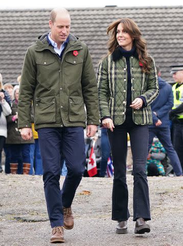 <p>Jane Barlow - WPA Pool/Getty Images</p> Prince William and Kate Middleton wear poppies in Scotland on Nov. 2, 2023