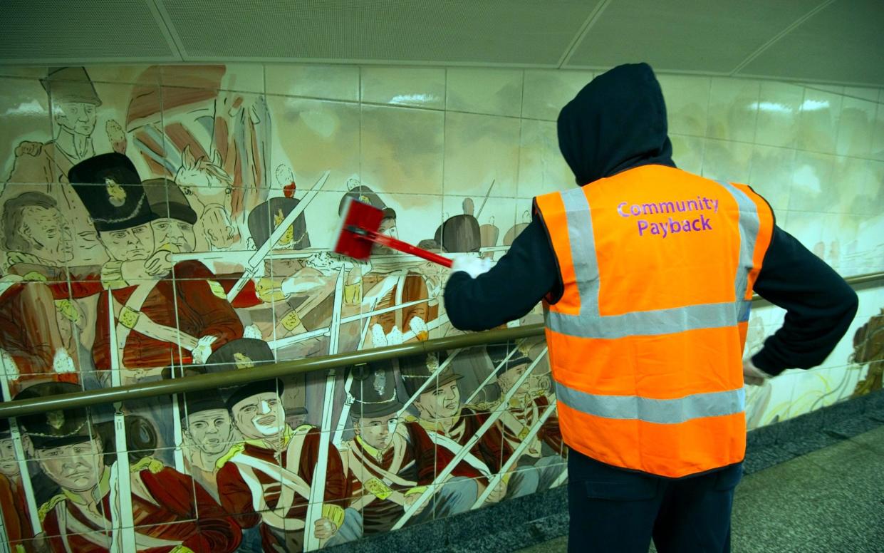 Young offenders cleaning the pedestrian tunnels under Hyde Park Corner - Paul Grover
