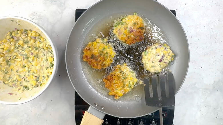 flipping corn and jalapeño fritters 