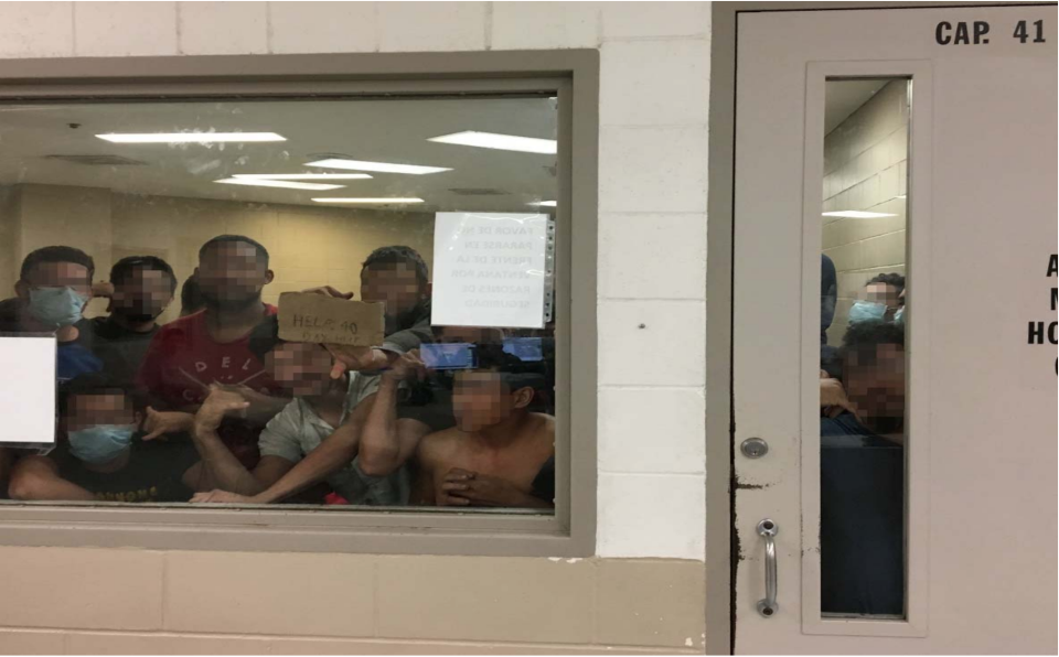 Eighty-eight men crowd into a cell with a maximum capacity of 41 on June 12 at the Border Patrol's Fort Brown Station. Some of the men signal their prolonged detention to OIG staff.