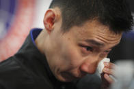 Malaysian badminton player Lee Chong Wei wipes his tears during a press conference in Putrajaya, Malaysia, Thursday, June 13, 2019. Former World No. 1-ranked Lee has announced his retirement from badminton after 19 years following his battle with cancer. (AP Photo/Vincent Thian)