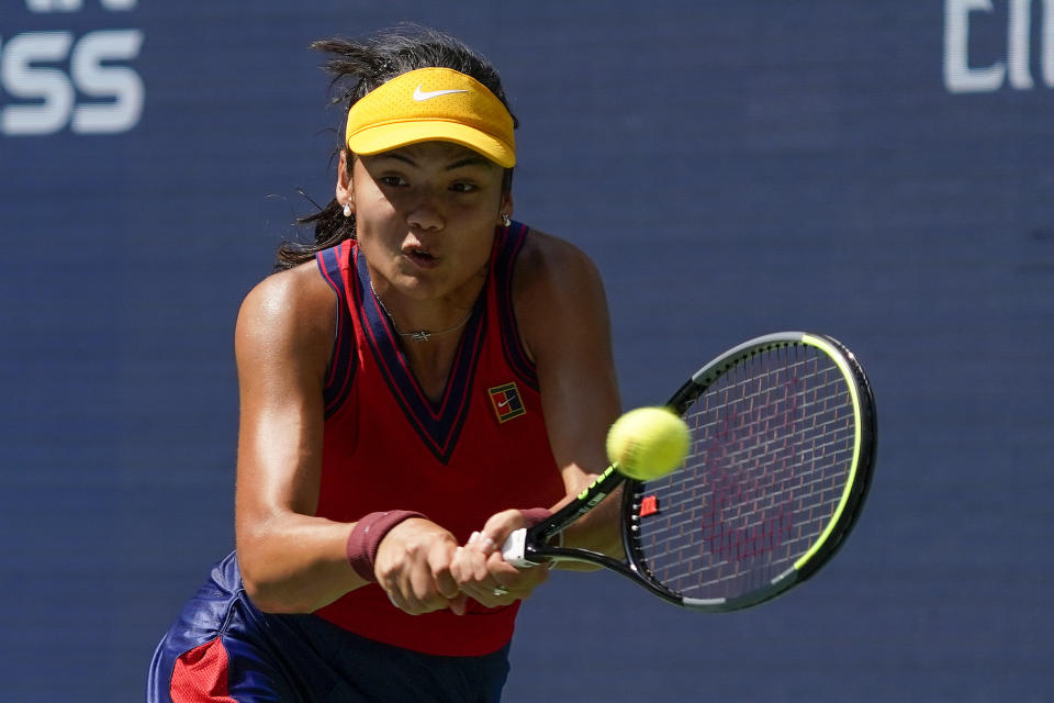 Emma Raducanu, of Great Britain, returns a shot to Belinda Bencic, of Switzerland, during the quarterfinals of the US Open tennis championships, Wednesday, Sept. 8, 2021, in New York. (AP Photo/Elise Amendola)