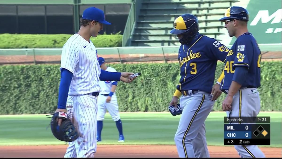 Cubs Player Anthony Rizzo Gives Hand Sanitizer to Opponent During Game