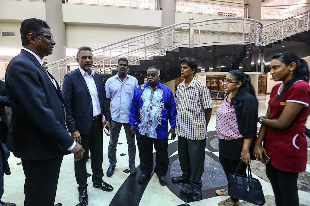 RSN Rayer and Ramkarpal Singh meet the relatives of the detainees at the Kuala Lumpur Courts Complex October 21, 2019. — Picture by Hari Anggara