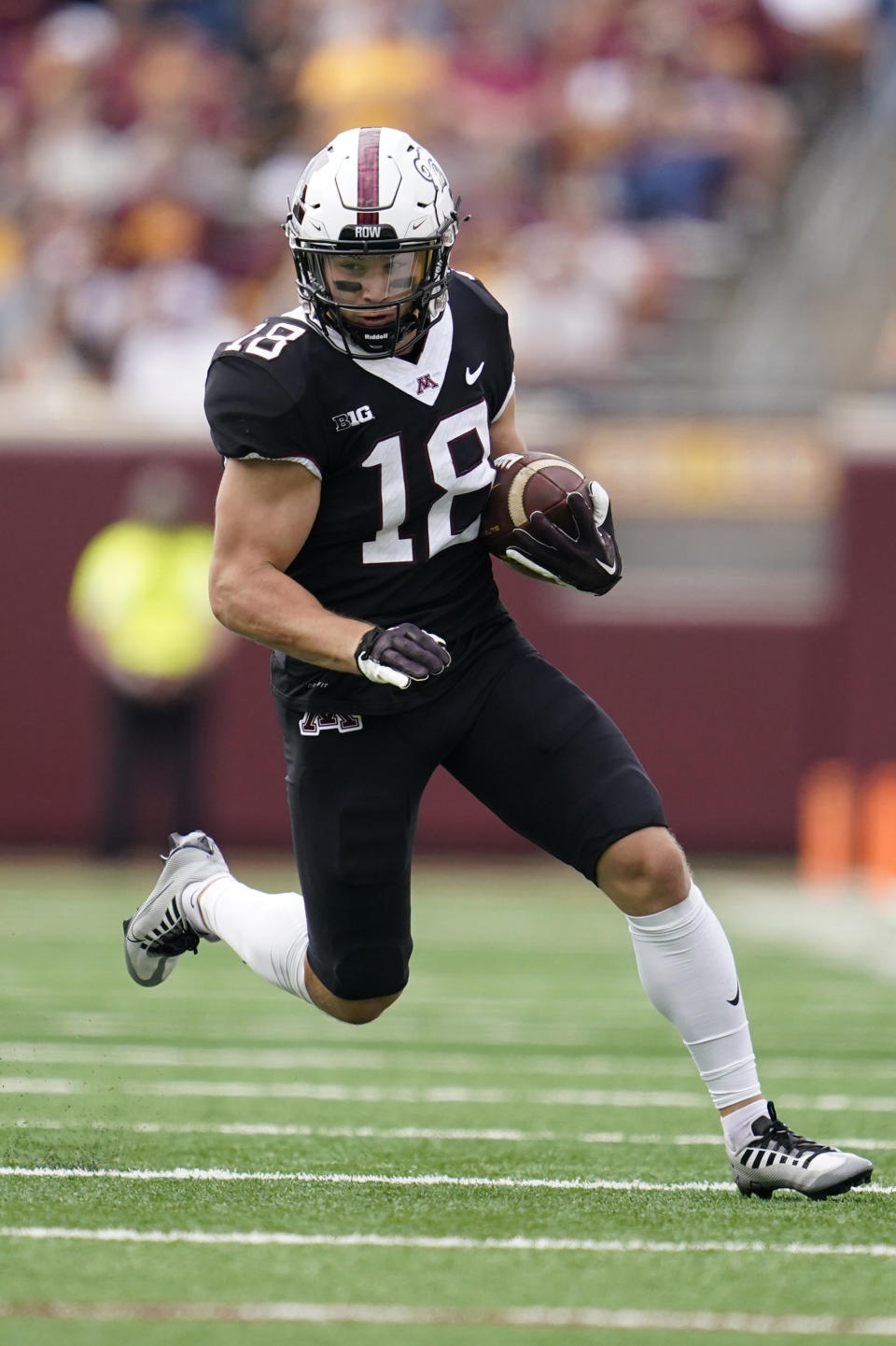 Minnesota wide receiver Clay Geary carries the ball during the second half of an NCAA college football game against Western Illinois, Saturday, Sept. 10, 2022, in Minneapolis. (AP Photo/Abbie Parr)