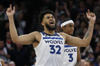 Minnesota Timberwolves center Karl-Anthony Towns celebrates his free throws to give his team the lead over the Atlanta Hawks with seconds left in the fourth quarter of an NBA basketball game Wednesday, March 22, 2023, in Minneapolis. The Timberwolves won 125-124. (AP Photo/Bruce Kluckhohn)