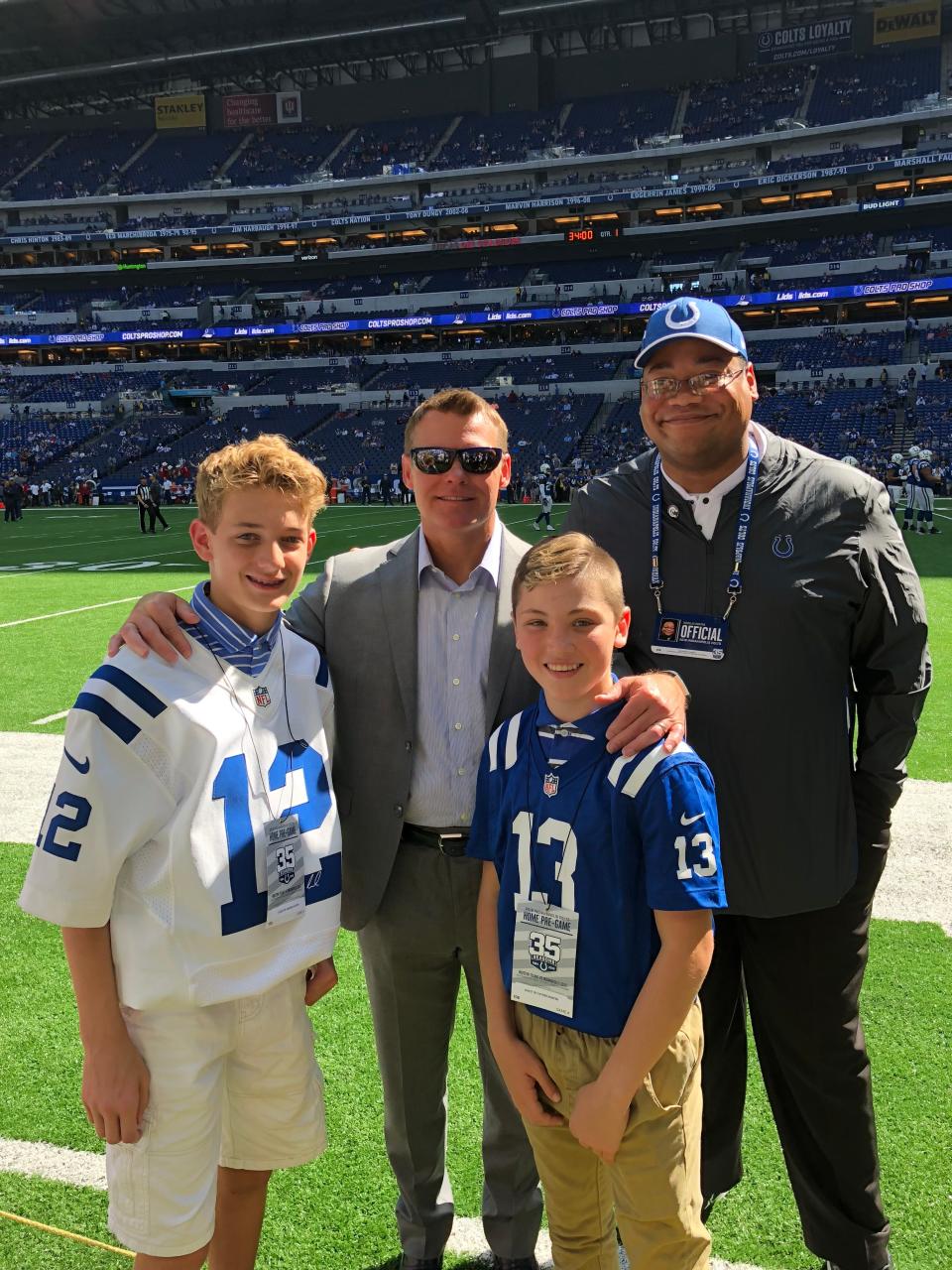 Father Douglas Hunter (right) with Indianapolis Colts general manager Chris Ballard.