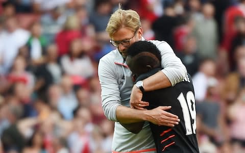 Sadio Mane and Jurgen Klopp at the Emirates - Credit: EPA