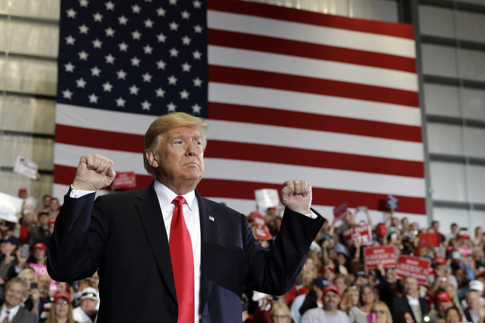 President Donald Trump looks to the crowd after speaking at a campaign rally at Pensacola International Airport, Saturday, Nov. 3, 2018, in Pensacola, Fla. (AP Photo/Evan Vucci)