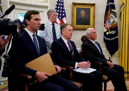 FILE PHOTO: (L-R) White House senior adviser Jared Kushner, national security adviser John Bolton, U.S. Trade Representative Robert Lighthizer and Vice President Mike Pence look on as U.S. President Donald Trump announces a deal to replace the North American Free Trade Agreement (NAFTA) at the White House in Washington, U.S., August 27, 2018. REUTERS/Kevin Lamarque/File Photo