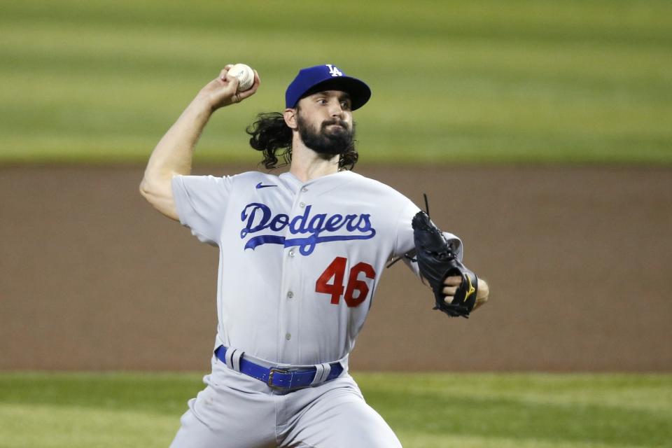 Los Angeles Dodgers starting pitcher Tony Gonsolin throws a pitch against the Arizona Diamondbacks.