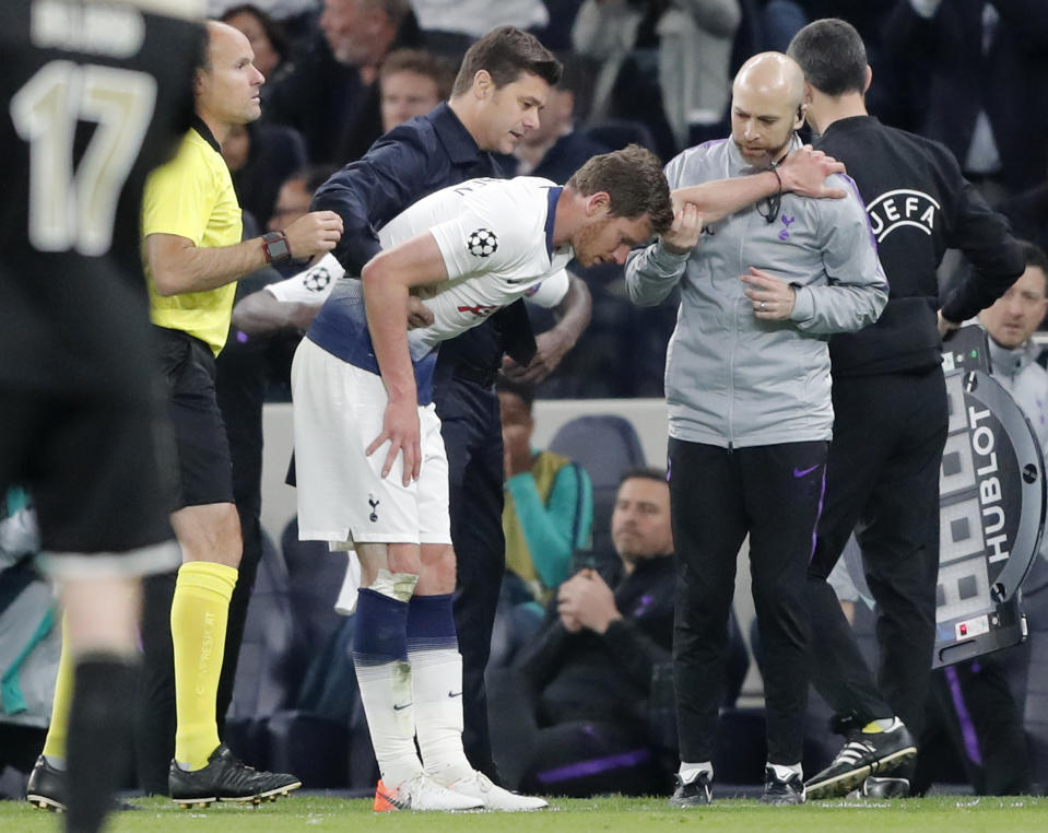 Tottenham's Jan Vertonghen walks off the pitch with a head injury during the Champions League semifinal first leg soccer match between Tottenham Hotspur and Ajax at the Tottenham Hotspur stadium in London, Tuesday, April 30, 2019. (AP Photo/Frank Augstein)