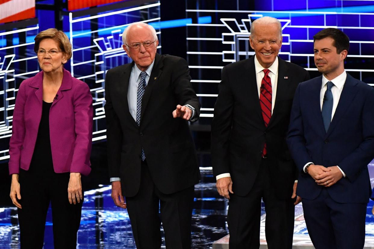 Elizabeth Warren, Bernie Sanders, Joe Biden and Pete Buttigieg at the Las Vegas Democratic debate ahead of the Nevada caucuses: AFP via Getty Images