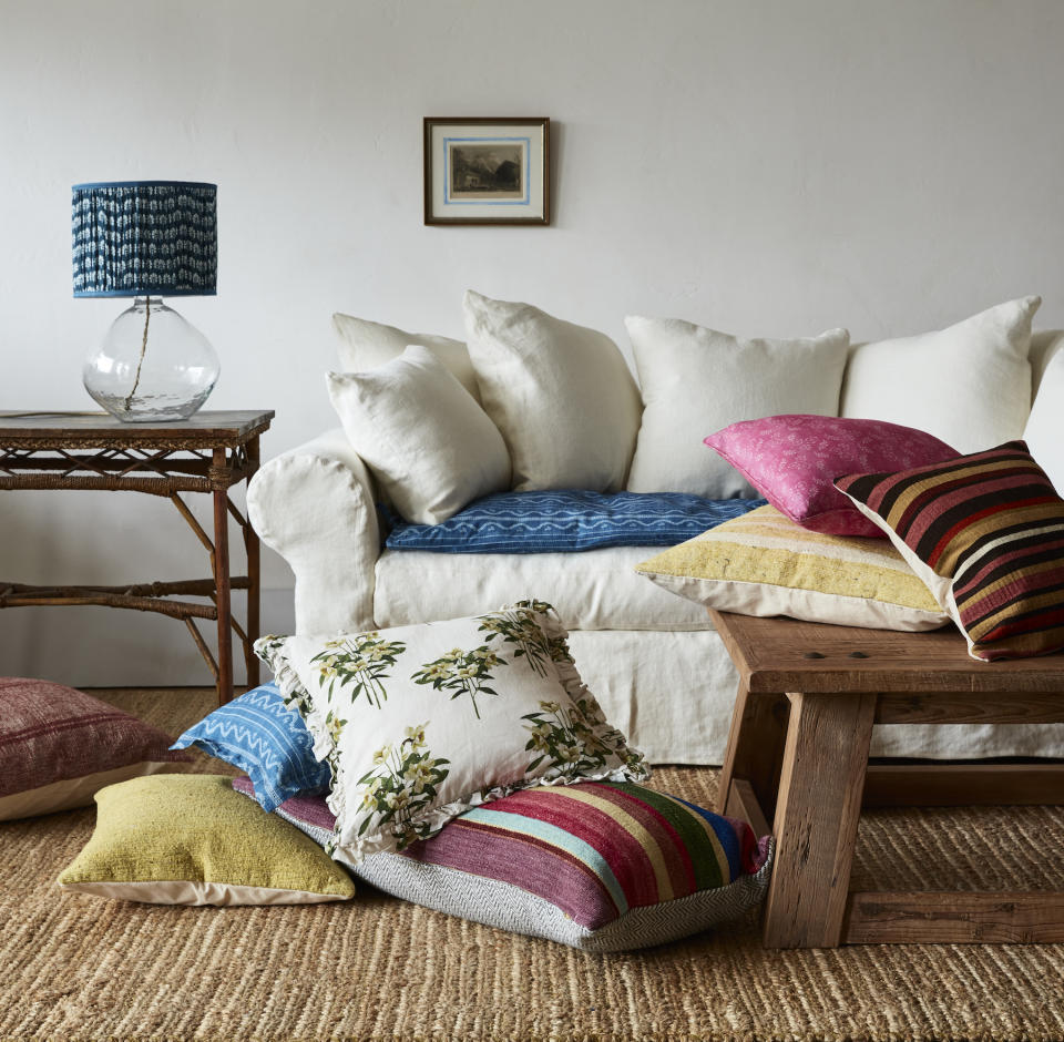 Sofa, pillows and lighting from GreenRow.