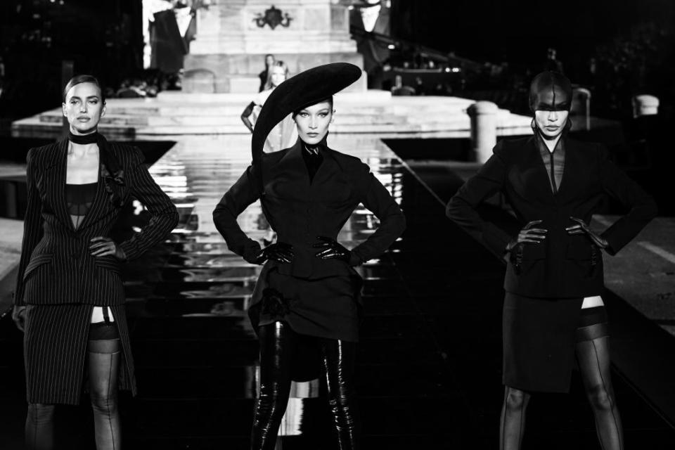 FLORENCE, ITALY - JUNE 13: [Editor's Note: Image was converted to black and white] (L-R) Irina Shayk, Bella Hadid and Joan Smalls walk the CR Runway x Luisaviaroma during Pitti Immagine Uomo 96 on June 13, 2019 in Florence, Italy. (Photo by Vittorio Zunino Celotto/Getty Images)