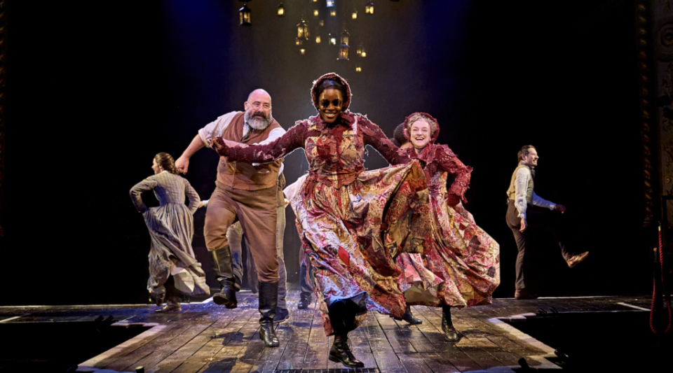 Frances McNamee as Belle, Alastair Parker as Fezziwig, Gemma Knight Jones as Ghost of Christmas Present, Julie Jupp as Ghost of Christmas Past and Samuel Townsend as Fred (Image: Manuel Harlan)