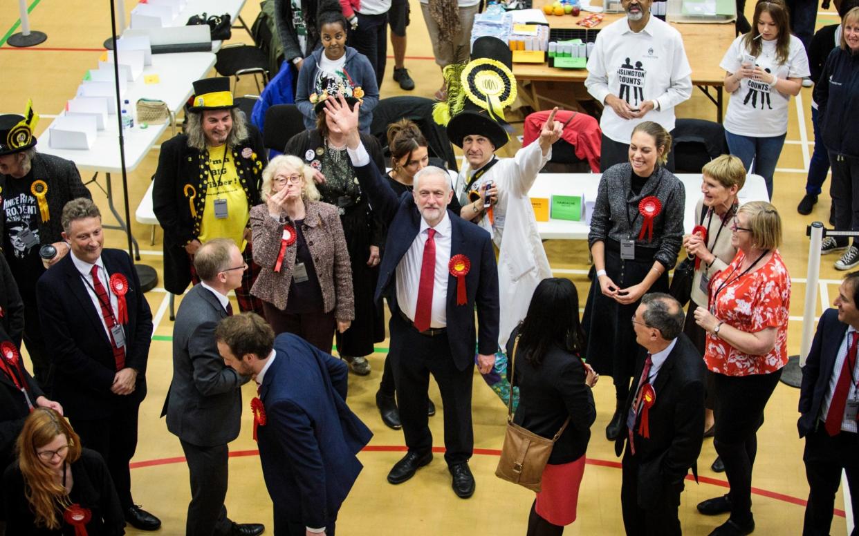 Labour Leader Jeremy Corbyn waves as he arrives at the Sobell Leisure Centre during the Islington North and the Islington South and Finsbury count - Getty Images Europe