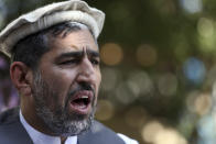 In this Thursday, May 30, 2019 photo, Ajmal Omar a member of the Nangarhar provincial council speaks during an interview with The Associated Press in the city of Jalalabad, Afghanistan. The Islamic State group has lost its caliphate in Syria and Iraq, but in the forbidding mountains of northeastern Afghanistan the group is expanding its footprint, recruiting new fighters and plotting attacks in the United States and other Western countries. Omar said IS now has a presence in the provinces of Nangarhar, Nuristan, Kunar and Laghman. (AP Photo/Rahmat Gul)