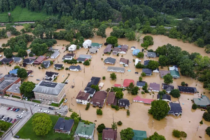 JULY 28, 2022: Aerial view of homes submerged under flood waters from the North Fork of the Kentucky River in Jackson, Kentucky. Flash flooding caused by torrential rains has killed at least eight people in eastern Kentucky and left some residents stranded on rooftops and in trees, the governor of the south-central US state said.