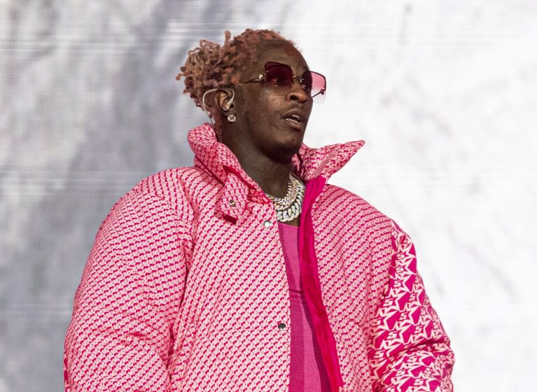 FILE - Young Thug performs at the Lollapalooza Music Festival in Chicago on Aug. 1, 2021. The rapper says that an apartment concierge let an unknown person take his Louis Vuitton bag holding jewelry, money and about 200 unreleased songs. (Photo by Amy Harris/Invision/AP, File)
