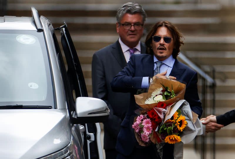 Actors Johnny Depp and Amber Heard at the High Court in London