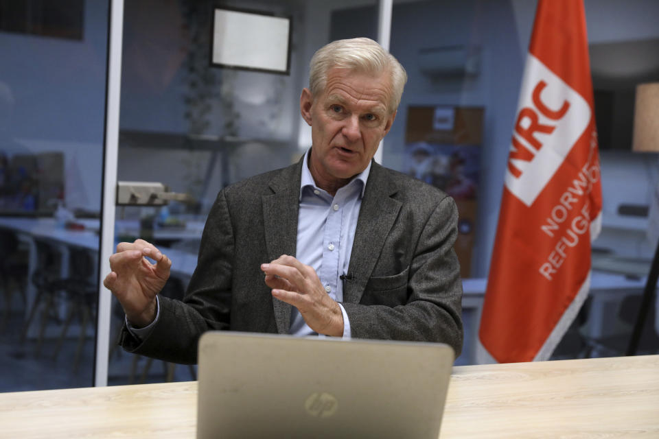 Secretary General of the Norwegian Refugee Council, NRC, Jan Egeland speaks in an interview with The Associated Press in Tehran, Iran, Wednesday, Nov. 10, 2021. Thousands of Afghan refugees are fleeing the Taliban into neighboring Iran every day and the trend could become a crisis for Europe, Egeland said Wednesday. (AP Photo/Vahid Salemi)